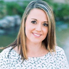 Michelle Wood - Business Headshot white patterned blouse blurred nature background